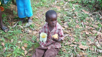 an orphan child with food and drink